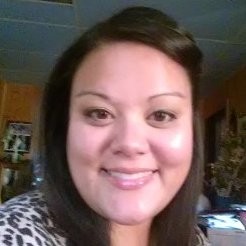 Jayne Loftis - Your Nutritional Consultant - Nice headshot on a grey background.